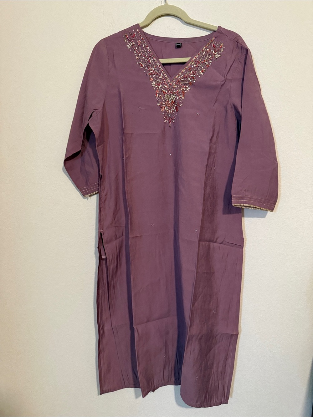 Lilac kurta with embroidery around the neckline and a beautiful dupatta